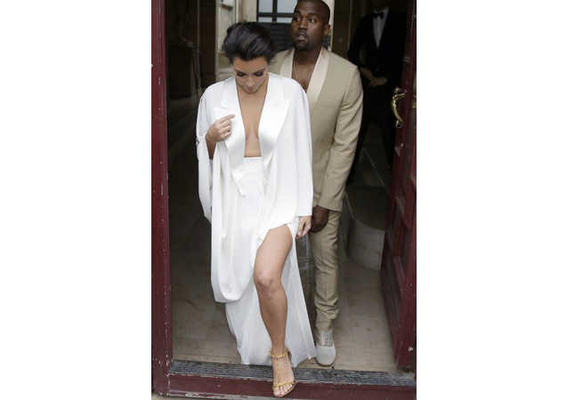 Kimye wearing ultrachic (and ultra cute!) matching outfits leaving Valentino's chateau in France right before their wedding.  