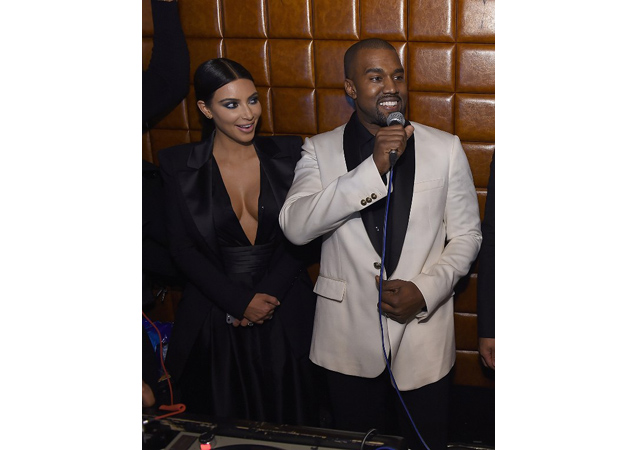 Kimye caught having a good time in contrasting suits at John Legend's birthday party earlier this month. 