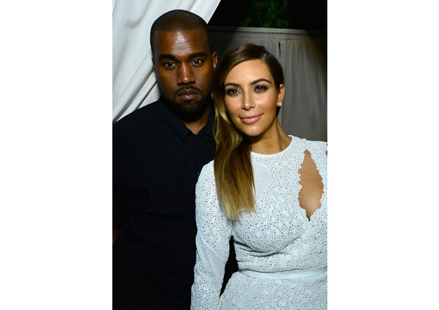 Mr. and Mrs. West were in perfect harmony in their black and white looks at a DuJour Magazine event in Miami Beach. 
