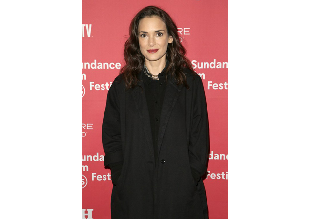 Winona Ryder came in an all black outfit that complimented her pale skin tone and deep red lipstick.