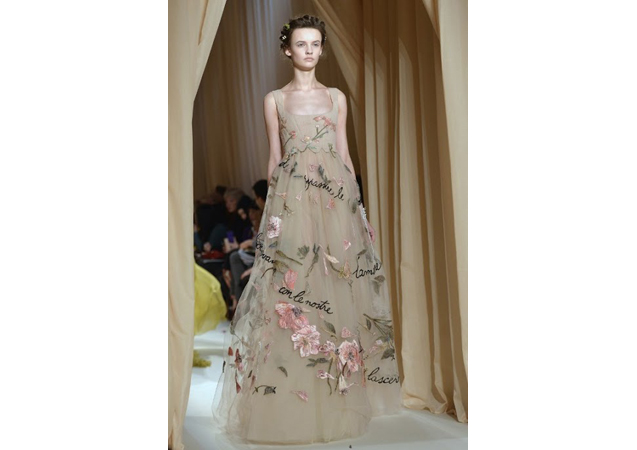Valentino channels period romance with the poem appliques and classic silhouette.