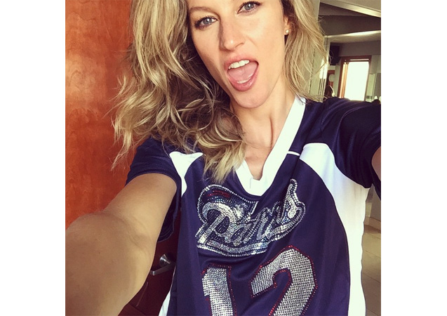 Gisele Bündchen shows her support for the Patriots in this sequined jersey. 