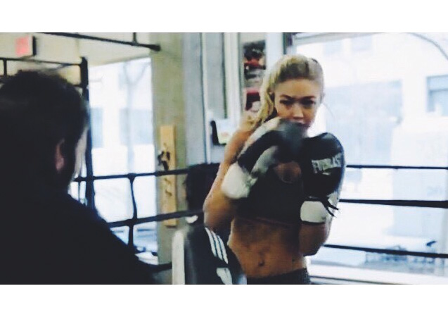 Don't let the blurry photo fool you, Gigi Hadid is ready for a touchdown...or a throwdown. 