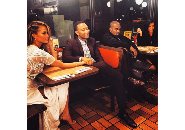 John Legend all-dressed up with his equally stylish gang at Le Casa de Waffle. 