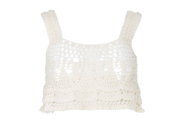Kelly, a cheerleader outfit? NO. However, you can still go back to your staple crop top. Here’s a boho-chic alternative by [link href='https://www.montaignemarket.com/EN_15986_New-in-store_Knitwear_Valentino_Valentino-beige-knitted-sweater.html' target='_blank']Anna Kosturova[/link].