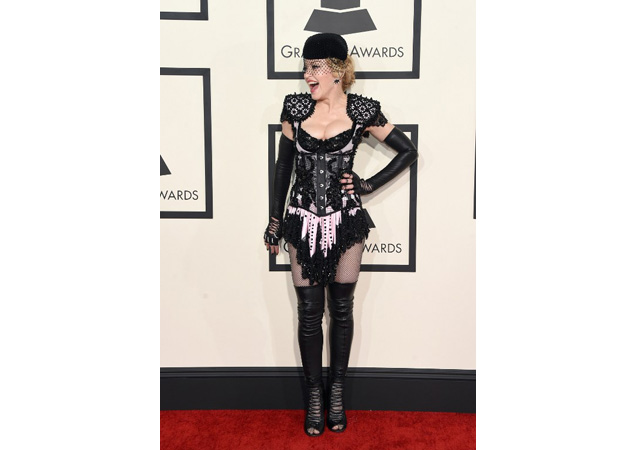 This outfit suggests that Madonna is on her 3rd (4th?) midlife crisis. Not pictured: her bare bottom. 