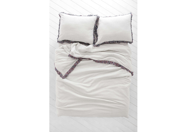 Update your space with fresh bedding and sheets. Magical Thinking Bala Yarn-Dyed Duvet Cover available at [link href='http://www.urbanoutfitters.com/urban/catalog/productdetail.jsp?id=33083338&parentid=A_DEC_BEDDING#/' target='_blank']Urban Outfitters[/link]. 