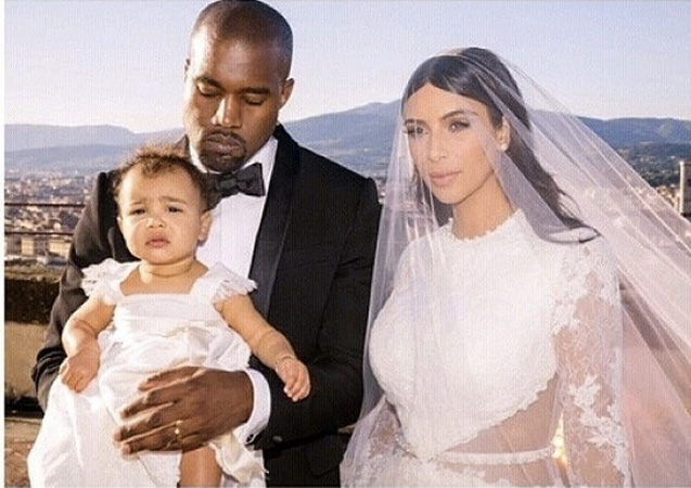 North looking as adorable as always in the West's first official family portrait.