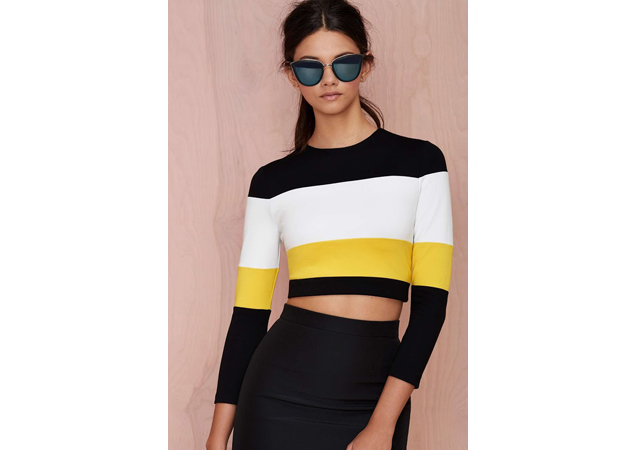 Yellow is in this season, but can be a hard color to wear all on its own. Try a colorblock sweater with a yellow accent. Touchdown Crop Sweater, available at [link href='http://www.nastygal.com/product/touchdown-crop-sweater' target='_blank']Nasty Gal[/link]. 
