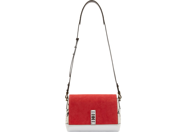 Oversized bags are getting downsized for spring, only the bare essentials are necessary. Proenza Schouler Elliot Bag, available at [link href='https://www.ssense.com/women/product/proenza_schouler/red-suede-colorblocked-feather-print-elliot-bag/432003' target='_blank']SSENSE[/link]. 