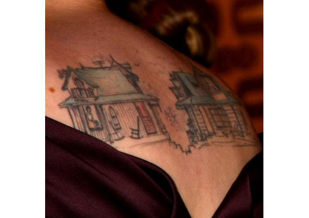 Lena Dunham has this half finished doll house plastered all over her back. Image via [link href='http://stealherstyle.net/tattoo/67943/' target='_blank']Steal Her Style[/link]. 