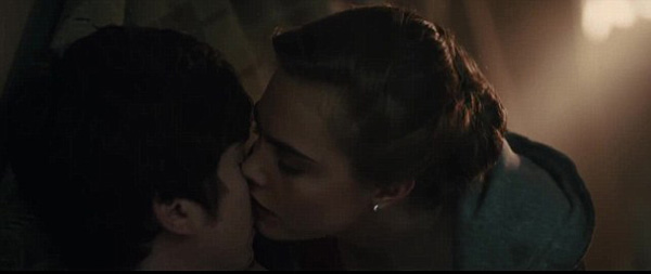 WATCH! Cara Delevingne Steals a Kiss from Nat Wolff