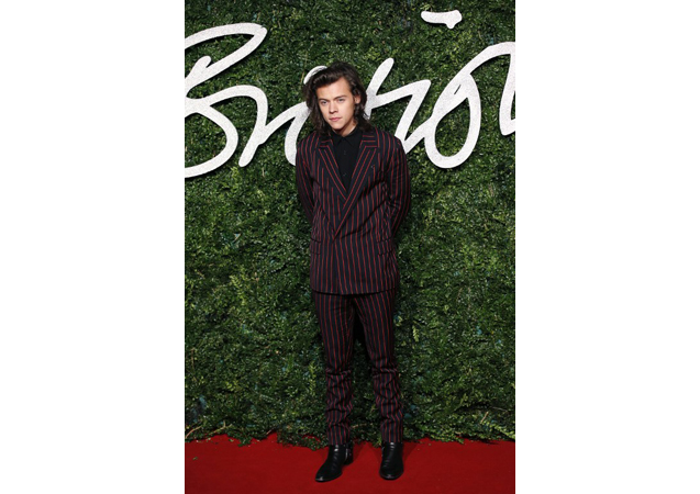 Harry went for an edgy, striped suit by Lanvin for his 2014 British Fashion Awards look.