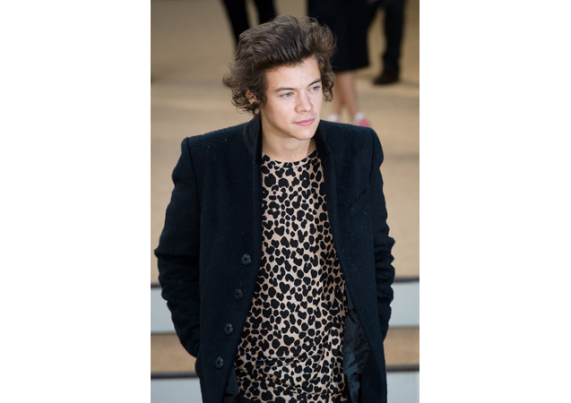 Harry had a "wow" moment at the Burberry Prorsum SS14 runway show with this leopard printed shirt.