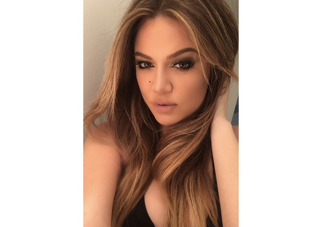 But Khloe definitely has the better Instagram selfie. 