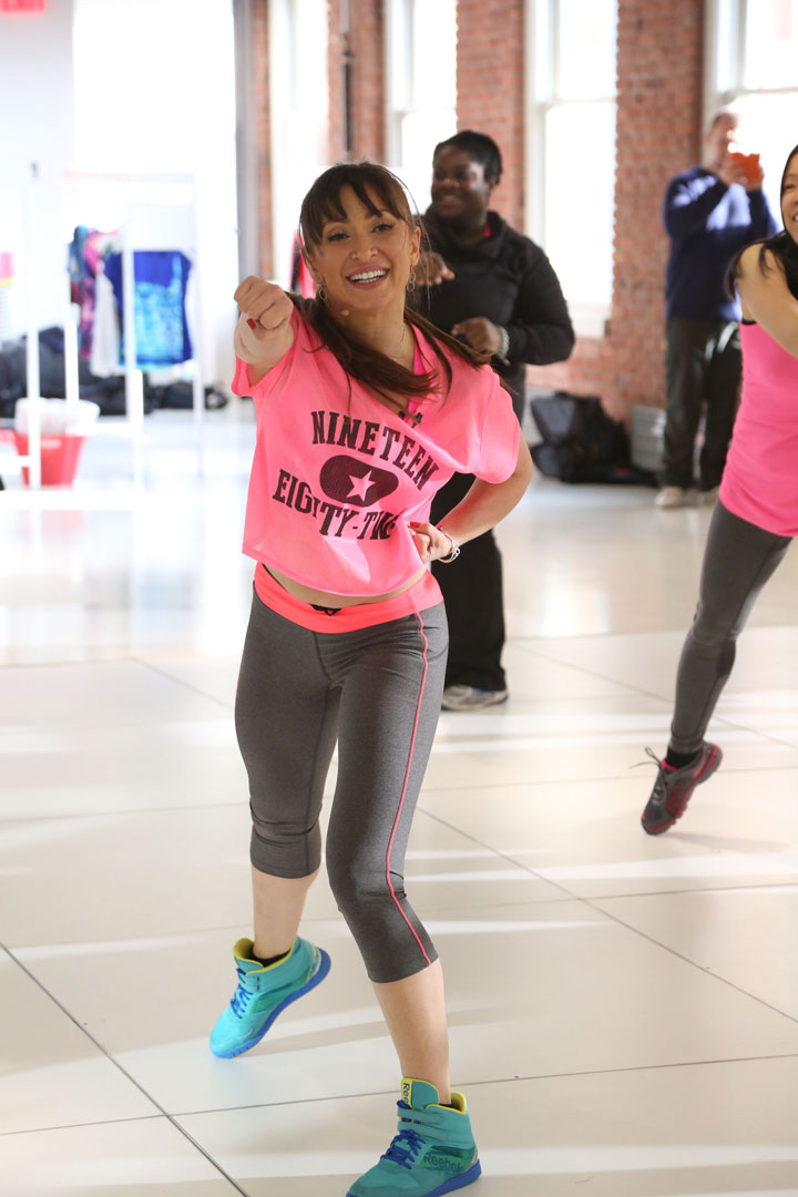 Karina Smirnoff wearing CityStreet and Xersion Activewear while teaching a danceclass at JCPenney's New Year, New You Fitness Event